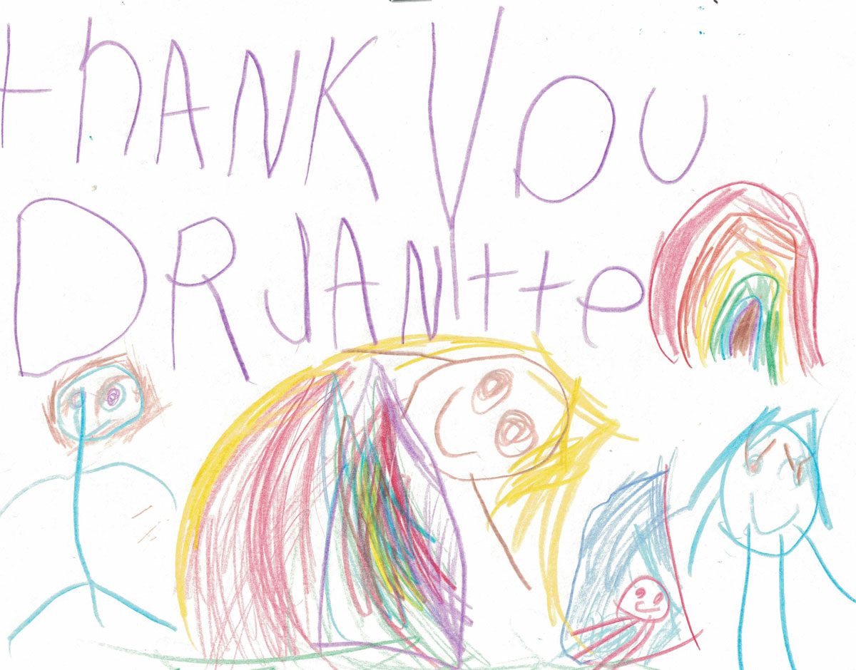 child's artwork of people and a rainbow with the saying "thank you dr janitte"