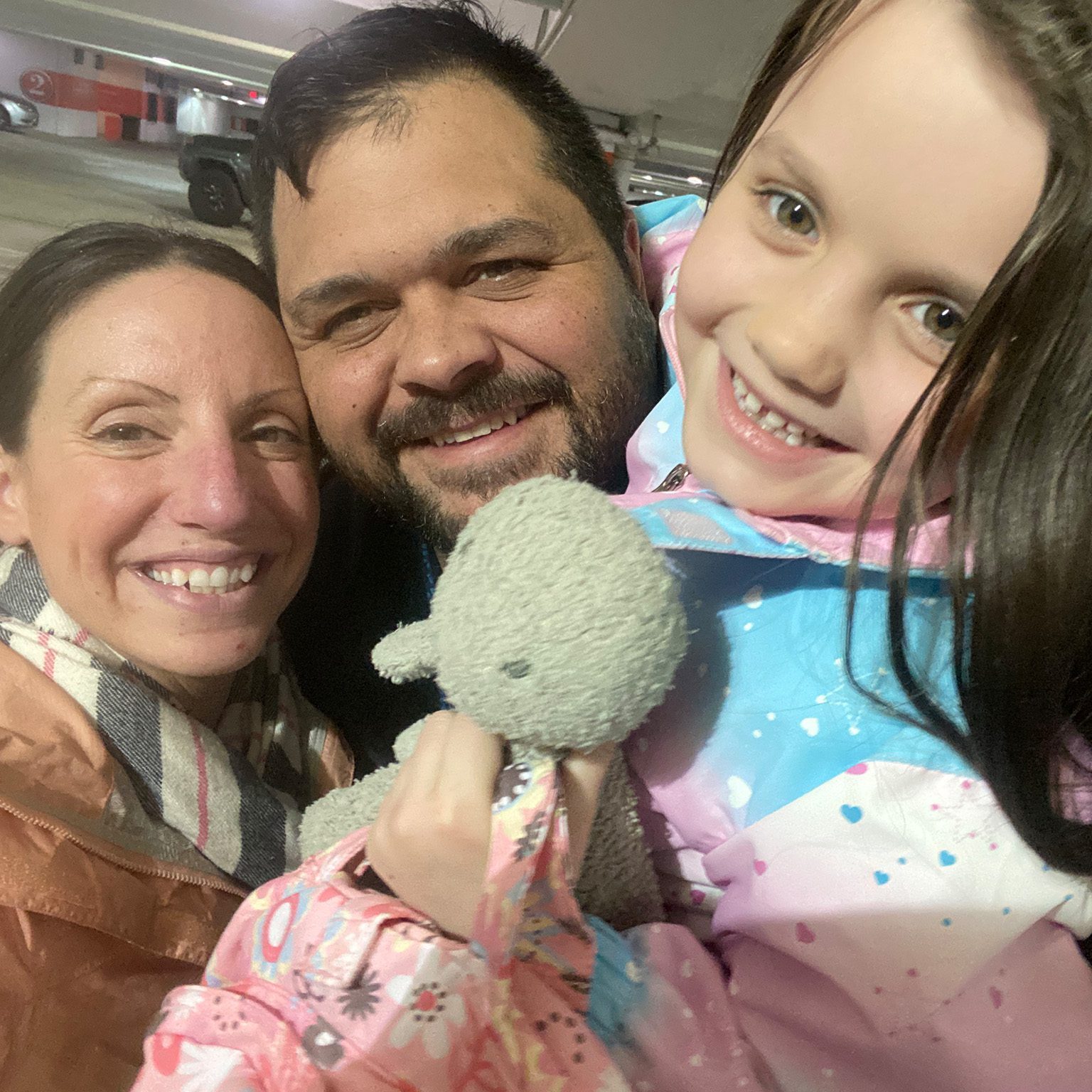 doctor with her husband and daughter